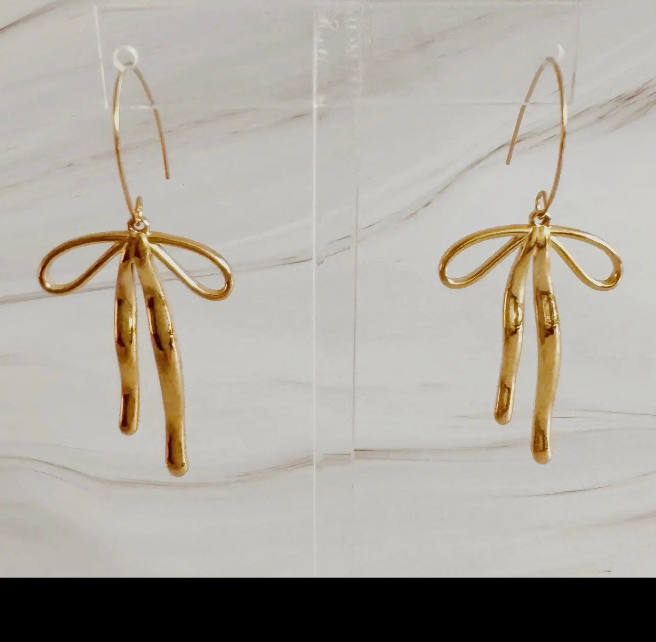 Stylist bow drop earrings