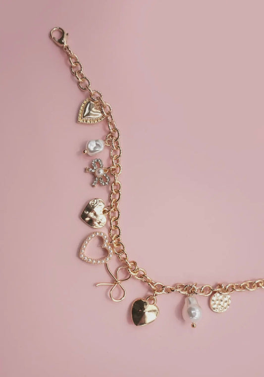 Charm bracelet-bow heart pearl disc gold bracelet