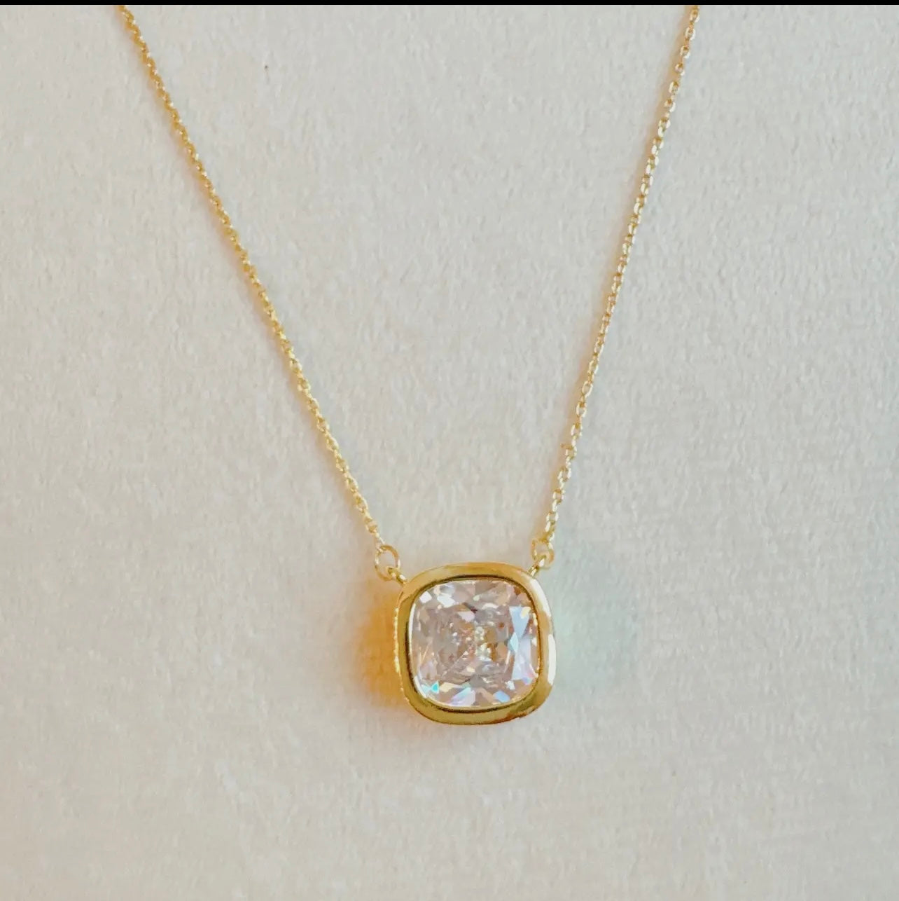 Cushion cut bezel diamond necklace