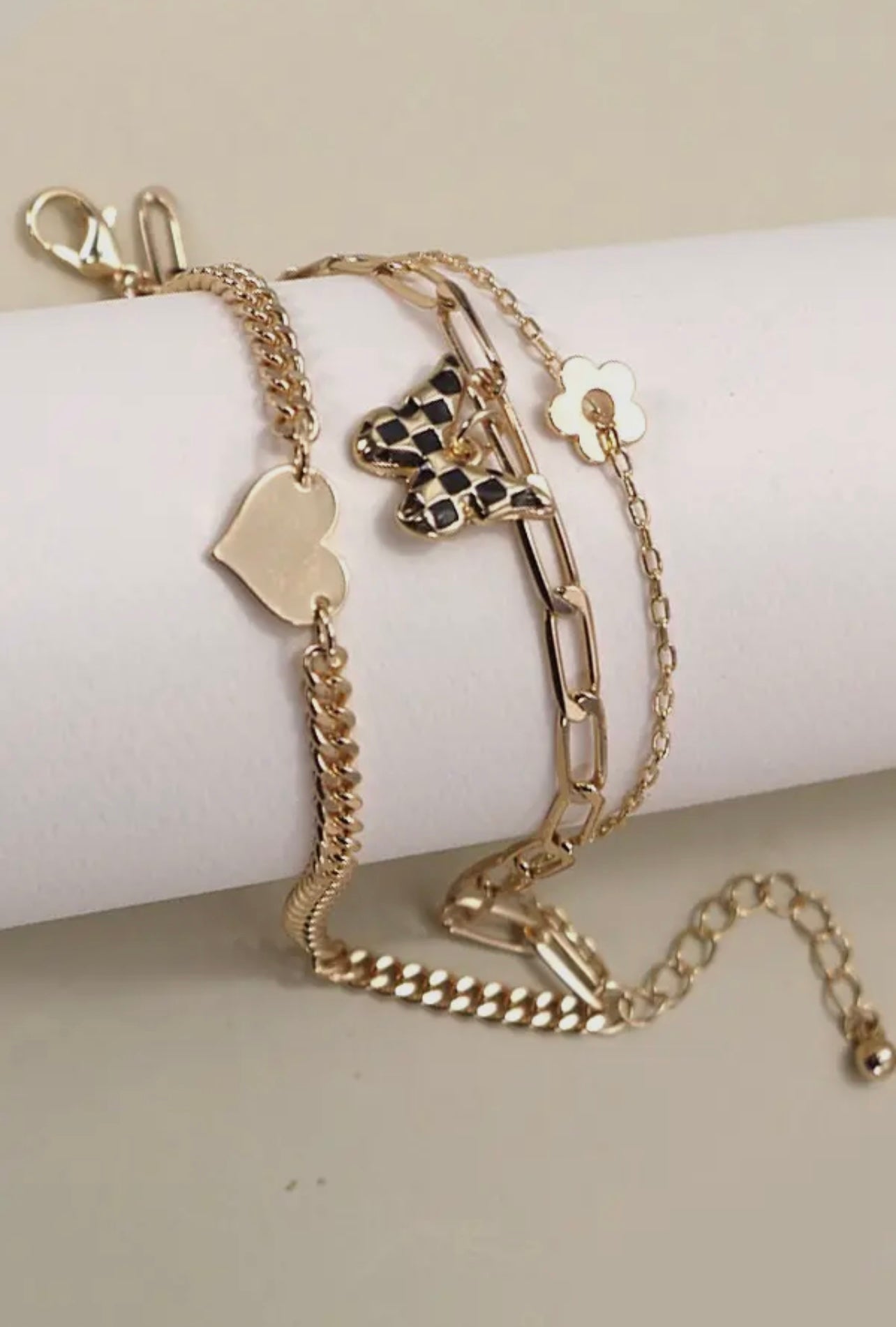 Triple layer flower, heart, butterfly gold bracelet